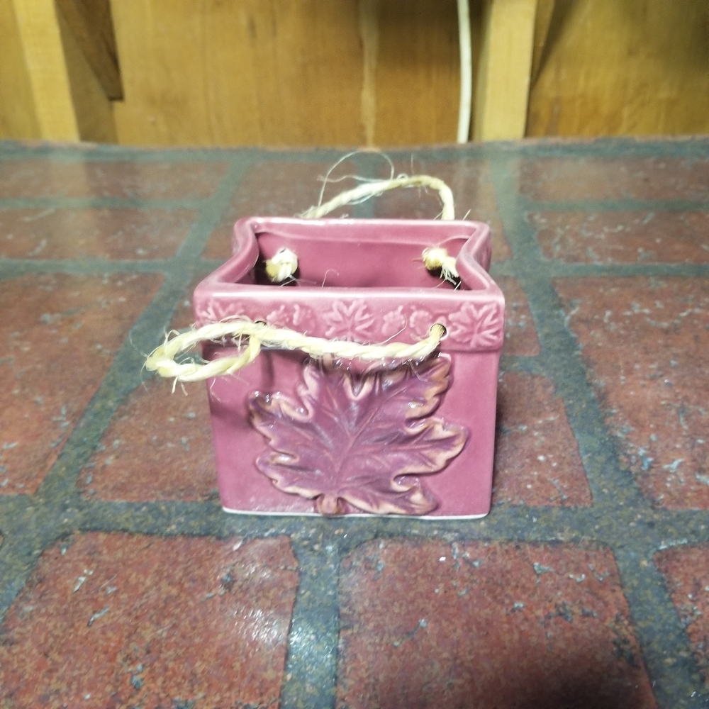 Small ceramic decorative piece.